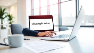 Engaged professional utilizing the eta application uk on a laptop in a bright office.